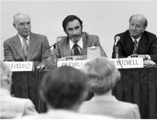From left] Harlan Cleveland, Paul Ehrlich, and George Mitchell at the Third Woodlands Conference, 1979. Schmandt, v.